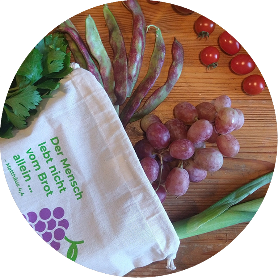 Symbolbild: Ein Gemüsenetz mit Obst und Gemüse